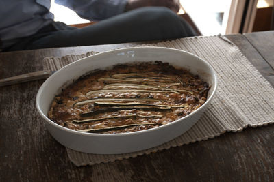 Close-up of quiche on a wooden table