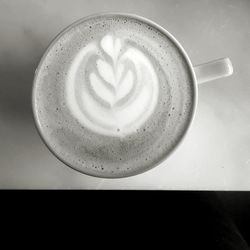 Close-up of coffee cup on table