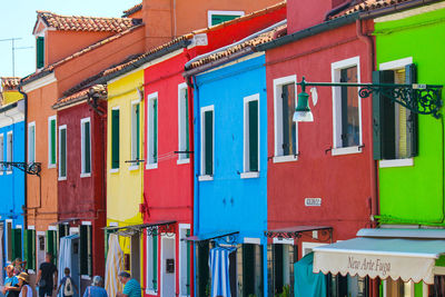 Multi colored residential buildings in city