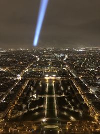 High angle view of illuminated buildings in city at night