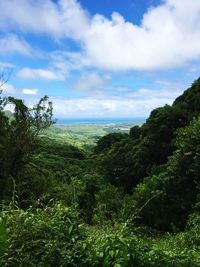 Scenic view of sea against cloudy sky