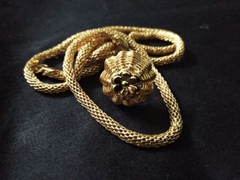 Close-up of rope tied on metal