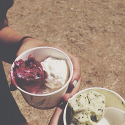 Close-up of cropped hand holding bowl