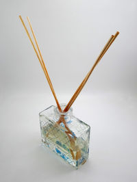 Close-up of traditional windmill against white background