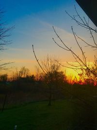 Scenic view of landscape against sky during sunset