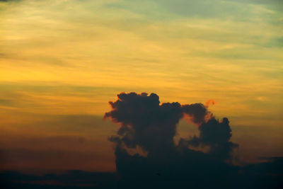 Scenic view of dramatic sky during sunset