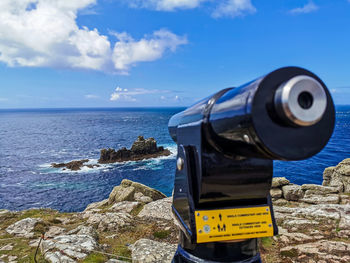 View of sea and rocks against sky