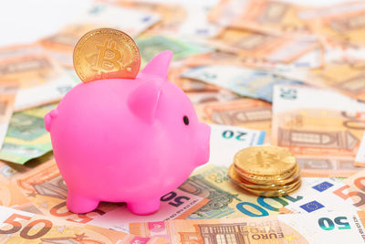 Close-up of coins on table