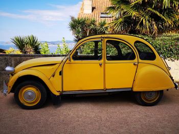 Yellow car on road