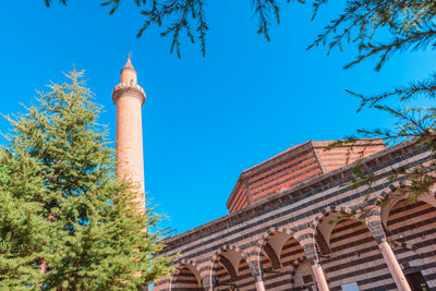 Low angle view of building against blue sky