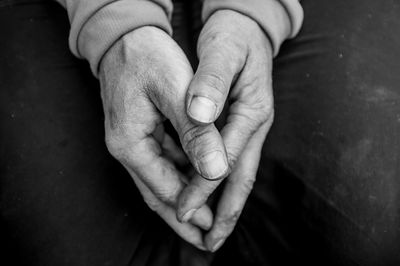 Close-up of person holding hands