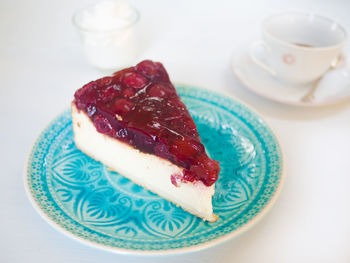 Close-up of cake served on table