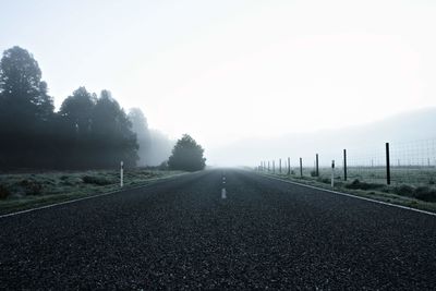 Empty road during foggy weather