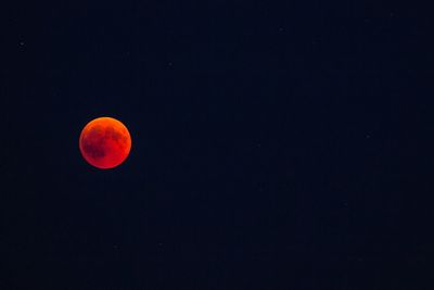 Scenic view of moon against sky at night