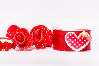 Close-up of heart shape over white background