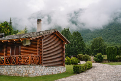 Wooden cabin by the mountain