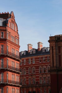 Low angle view of buildings against sky