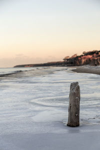 Scenic view of sea at sunset