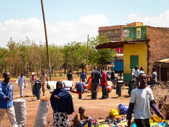 People at town square against sky