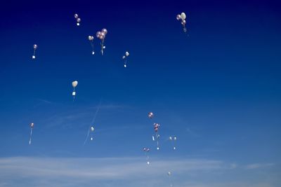 Low angle view of airshow in sky