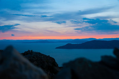 Scenic view of the titicaca lake against sky during sunset