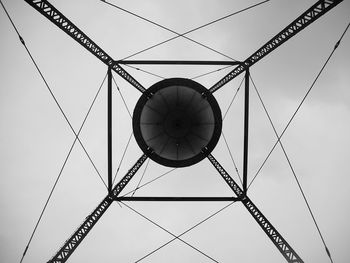 Low angle view of ferris wheel against sky