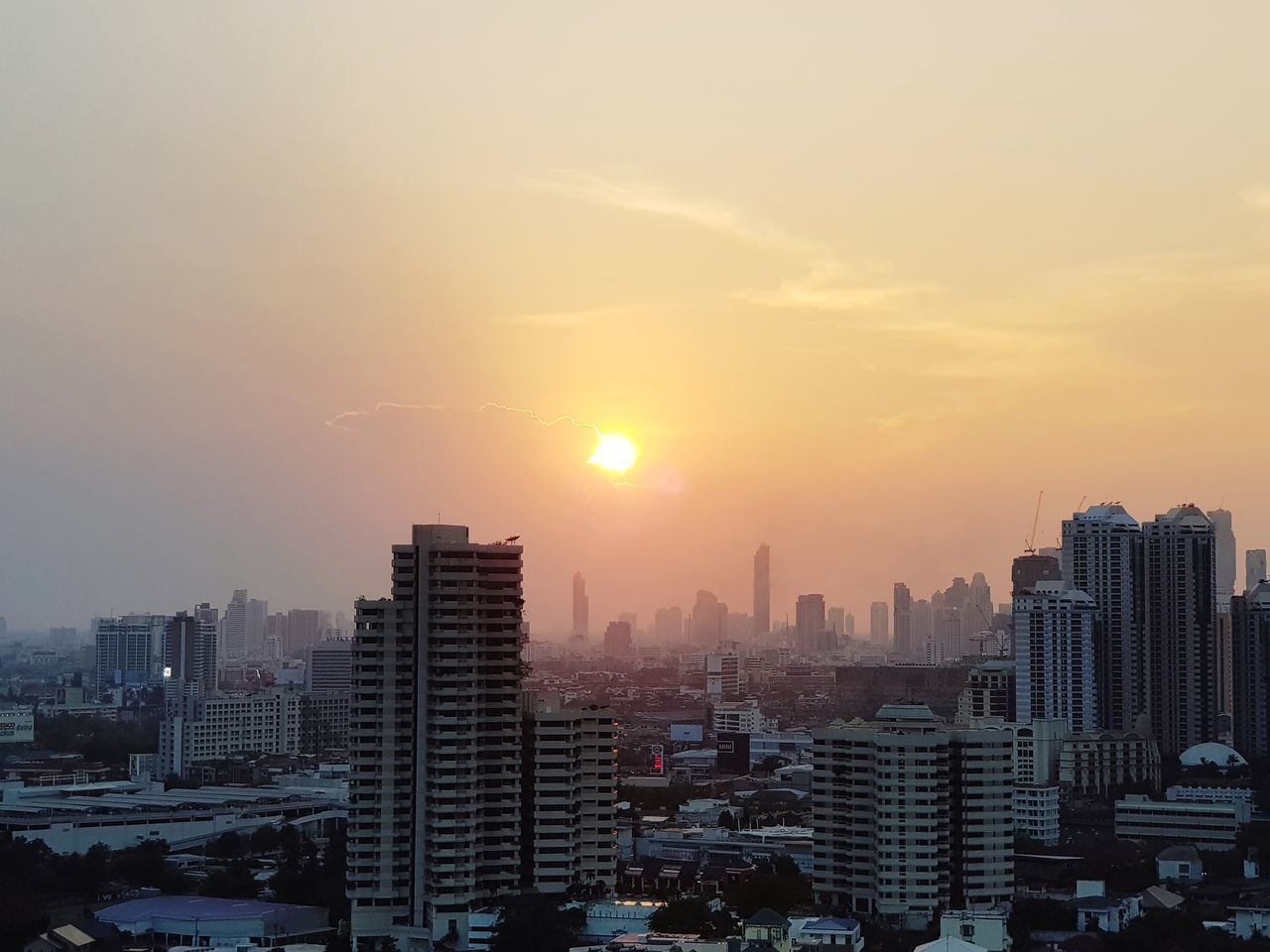 MODERN CITY AT SUNSET