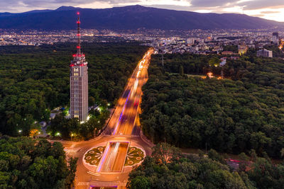 High angle view of illuminated buildings in city