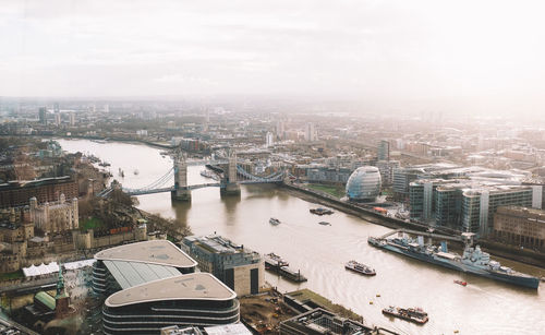 High angle shot of river along cityscape