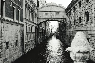 View of canal with buildings in background