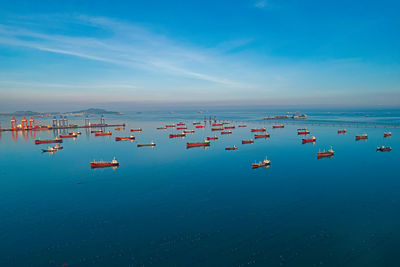 Aerial view of oil tankers, oil tankers unloading at port, import export petrochemicals.
