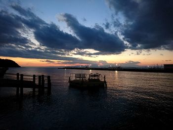 Scenic view of sea against dramatic sky