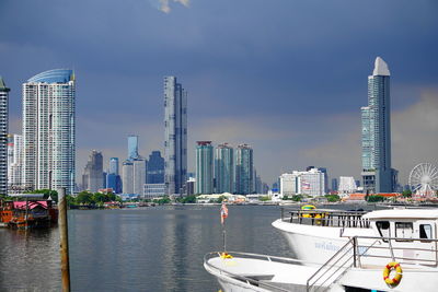 Modern buildings in city against sky