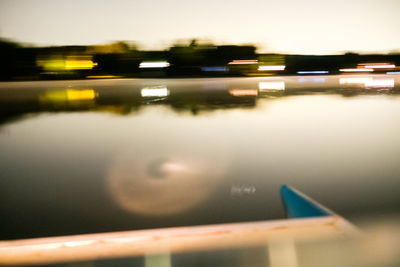 Close-up of airplane against sky at night