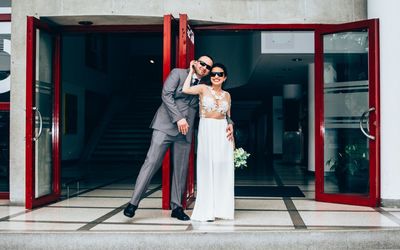 Full length of a young couple kissing in city
