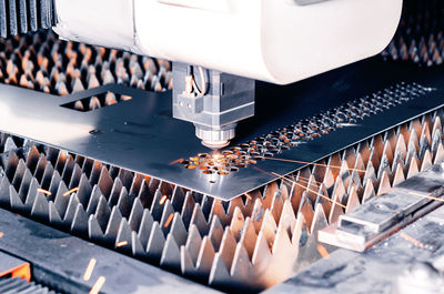 Metal cutting machine. laser cutting. sparks from laser cutting. close-up