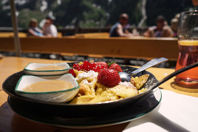 Close-up of breakfast served on table