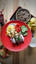 High angle view of fruits in plate on table