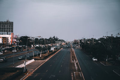 High angle view of vehicles on road in city