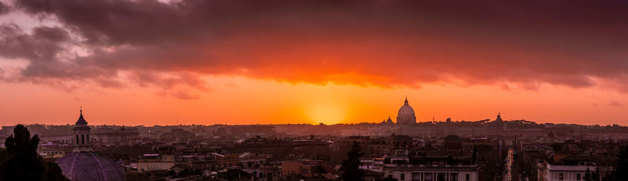 Cityscape against sky during sunset