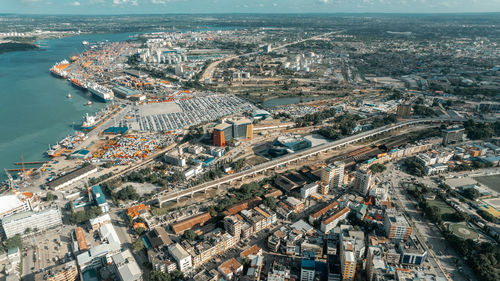 High angle view of townscape by sea