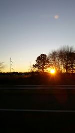 Scenic view of landscape at sunset