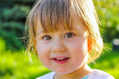 Close-up portrait of smiling boy