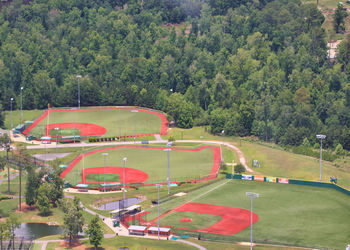 High angle view of soccer field against trees