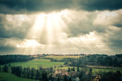 Scenic view of landscape against cloudy sky