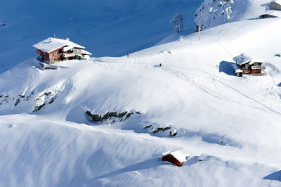 Scenic view of snow covered mountains