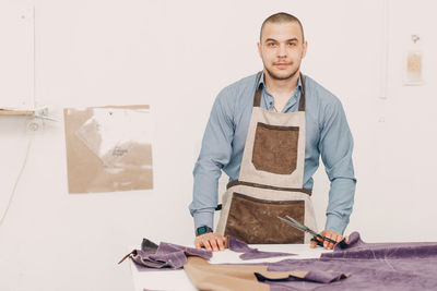 Portrait of young man working at home