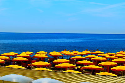 Scenic view of sea against blue sky