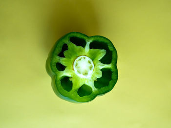 Close-up of fruit against green background