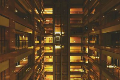 Low angle view of illuminated building at night